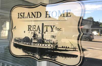 island realty real estate sign