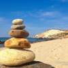 balanced stone pile on the beach