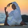 sunset beach african american boy yoga
