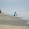 beach barefoot couple