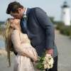 couple kissing lighthouse